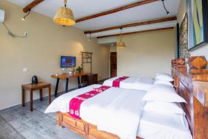Galería fotográfica de Jiaju Legend Homestay en Danba