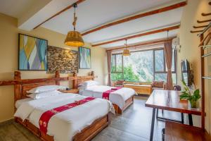 Galería fotográfica de Jiaju Legend Homestay en Danba
