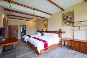 Galería fotográfica de Jiaju Legend Homestay en Danba