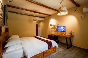 Galería fotográfica de Jiaju Legend Homestay en Danba