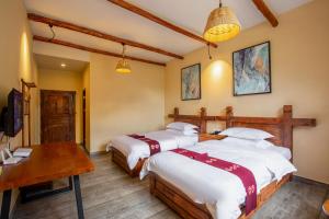 Galería fotográfica de Jiaju Legend Homestay en Danba