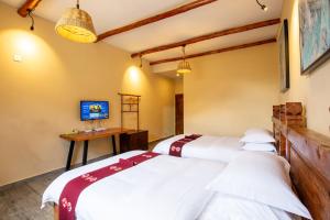 Galería fotográfica de Jiaju Legend Homestay en Danba