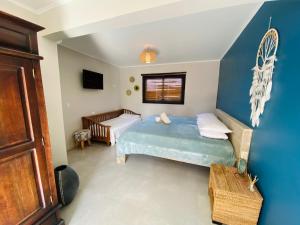 Cama ou camas em um quarto em Arubiana Inn Hotel