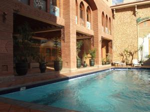 Bazén v ubytování Hotel Al Kabir nebo v jeho okolí
