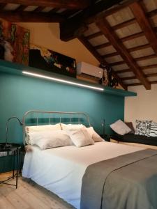 Giường trong phòng chung tại Relais San Rocco