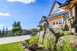 Vonkajšia záhrada v ubytovaní udanypobyt Villa Sywarne Prestige