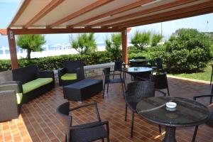 A balcony or terrace at Baia dei Mulini Resort & Spa
