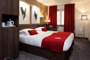 Postel nebo postele na pokoji v ubytování Best Western Plus Monopole Métropole