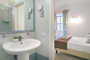 Kúpeľňa v ubytovaní White Candia Guesthouse