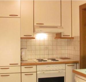 Kuchyň nebo kuchyňský kout v ubytování Ferienwohnung Argus Monika