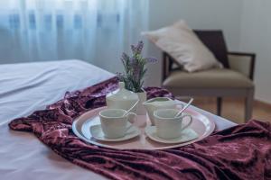 A bed or beds in a room at Villa Rosa