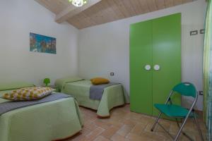 A bed or beds in a room at Villa Rosa