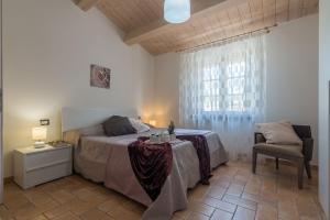 A bed or beds in a room at Villa Rosa
