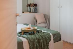 A bed or beds in a room at Villa Rosa