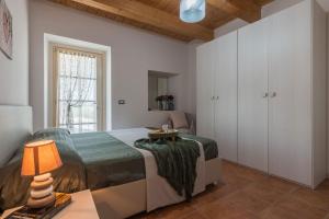 A bed or beds in a room at Villa Rosa
