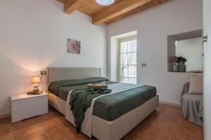 A bed or beds in a room at Villa Rosa