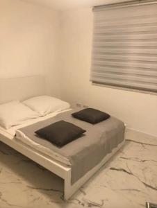 Säng eller sängar i ett rum på Luxusvilla Neubau 1