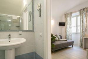 Kúpeľňa v ubytovaní White Candia Guesthouse