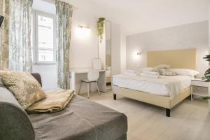 Posteľ alebo postele v izbe v ubytovaní White Candia Guesthouse
