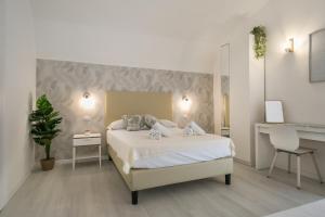 Posteľ alebo postele v izbe v ubytovaní White Candia Guesthouse