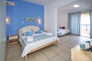 Postel nebo postele na pokoji v ubytování Miramare Hotel