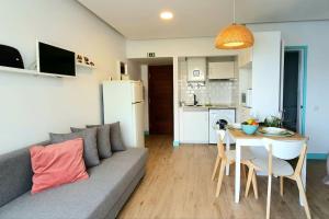 Χώρος καθιστικού στο Apartamentos do mar