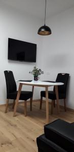 A television and/or entertainment centre at Apartment Hagen