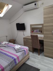 Postelja oz. postelje v sobi nastanitve Atina Lux Hostel