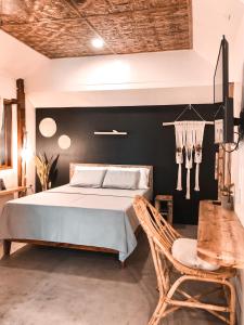 Tempat tidur dalam kamar di Happiness Beach Resort Siargao