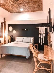 Postel nebo postele na pokoji v ubytování Happiness Beach Resort Siargao