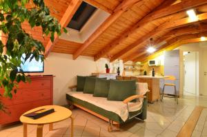 A seating area at AJO Apartments - Alte Donau Lake View Penthouse - Self-Check-in