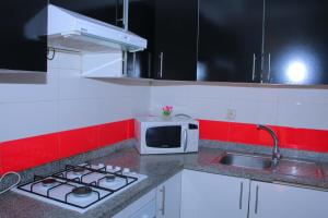 Η κουζίνα ή μικρή κουζίνα στο Bouznika 25