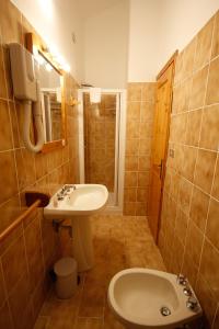 Koupelna v ubytování Hotel Col Serena