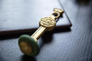 a gold key on top of a purse at Hotel Astoria, Best Western Signature Collection in Copenhagen
