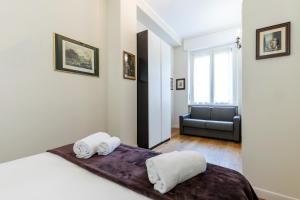 Posteľ alebo postele v izbe v ubytovaní Milan Retreats Cadorna Duomo