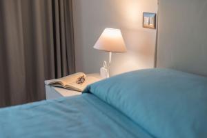 A bed or beds in a room at Villa Rosa
