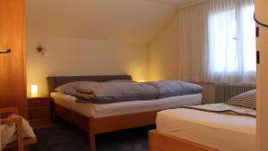 Postel nebo postele na pokoji v ubytování Appartement Maria