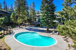 a swimming pool in the yard of a house at St Anton Condos with Rec Center in Mammoth Lakes