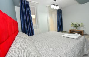Postel nebo postele na pokoji v ubytování Royal Accommodation