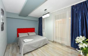 Postel nebo postele na pokoji v ubytování Royal Accommodation