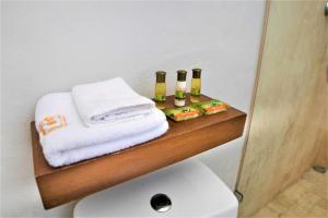 Postel nebo postele na pokoji v ubytování Hotel Caribe Merida Yucatan