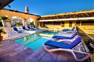 Bazén v ubytování Hotel Caribe Merida Yucatan nebo v jeho okolí