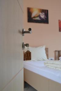 Letto o letti in una camera di Sobe Sova Kikinda