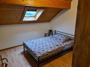Postel nebo postele na pokoji v ubytování Auberge de Ballens