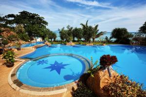 a large blue swimming pool with a star on it at 4 Bedroom Samui Family Pool Villa in Bophut 