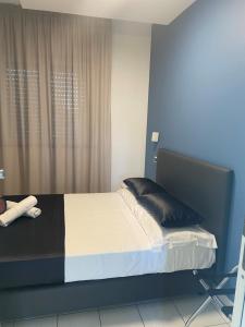 Posteľ alebo postele v izbe v ubytovaní Hotel Mediterraneo Ombrellone e Lettini Inclusi