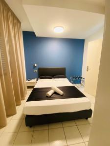 Posteľ alebo postele v izbe v ubytovaní Hotel Mediterraneo Ombrellone e Lettini Inclusi
