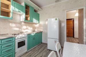  Кухня или мини-кухня в Economy Brusnika Apartments Maryino 