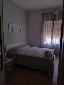 A bed or beds in a room at Casa Dema