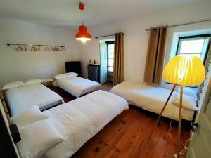 A bed or beds in a room at Ca Borines